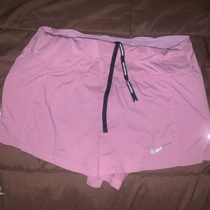 Pink Nike shorts